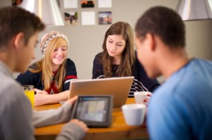 Teens using a tablet PC