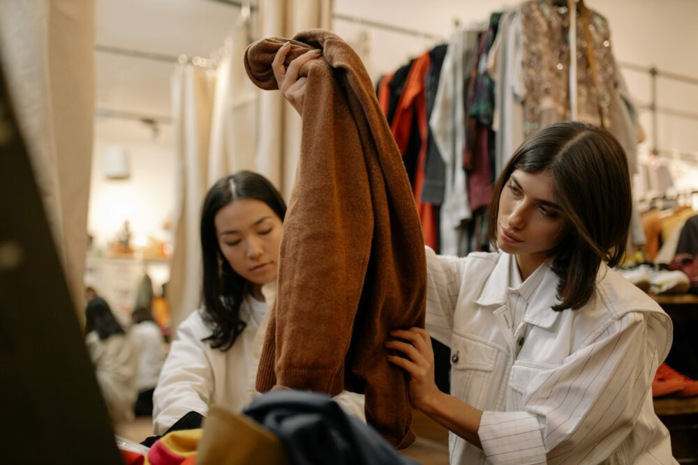 Two women shopping at a secondhand store